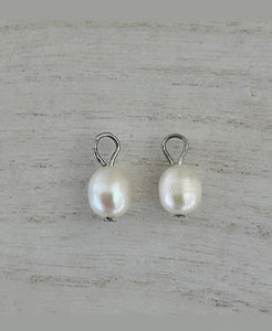 Oval Pearl charms only.